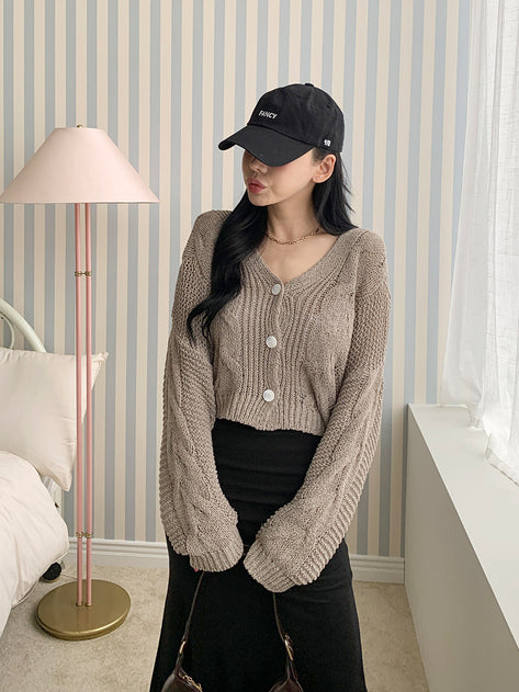 Levered boxy buckle cable knit long sleeve cardigan